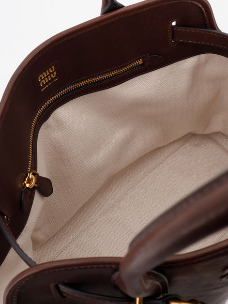 Aventure leather handbag with front lettering logo