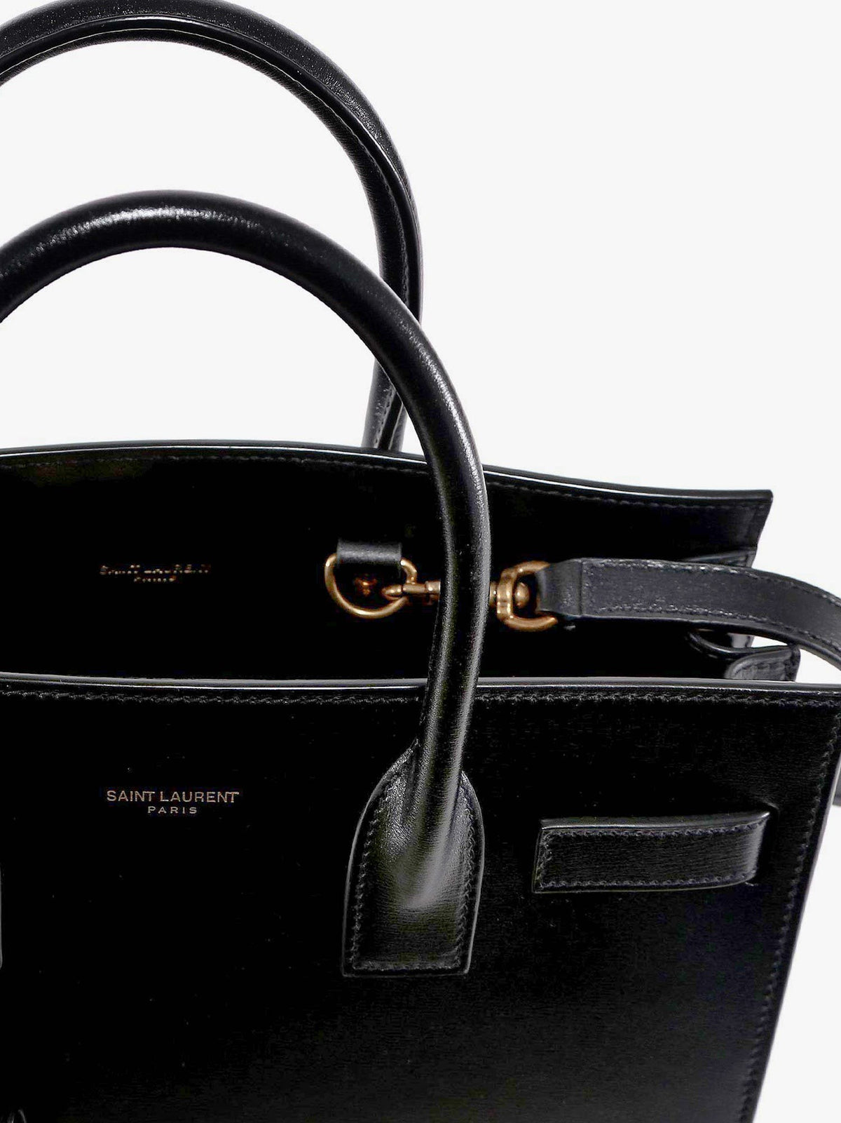 Saint Laurent Baby Sac de Jour leather handbag with padlock