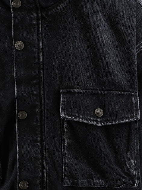 Black denim jacket with embroidered logo on the front