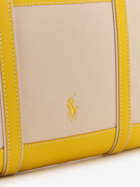 Canvas shoulder bag with embroidered logo on the front