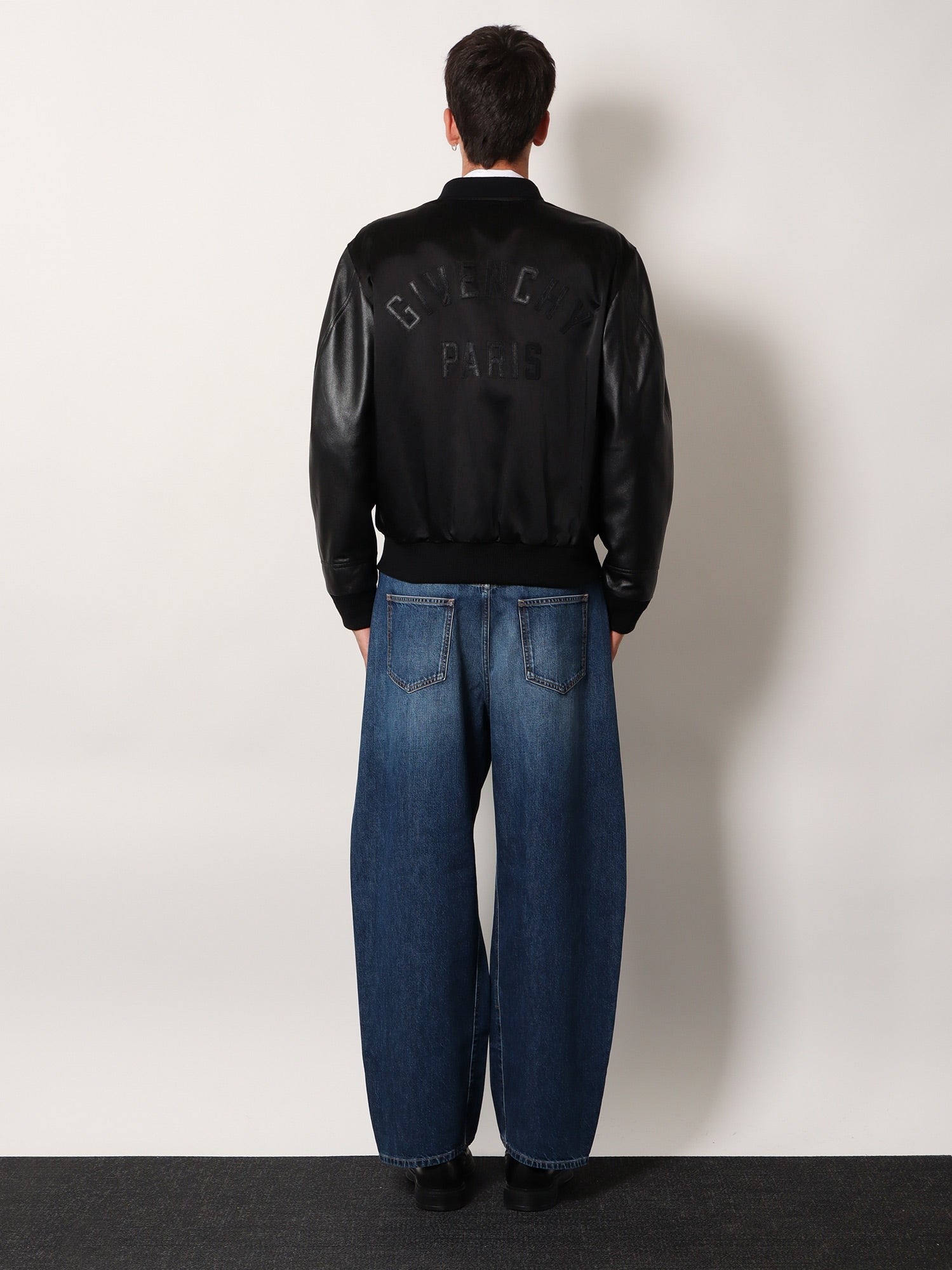 Cotton and nylon jacket with leather sleeves
