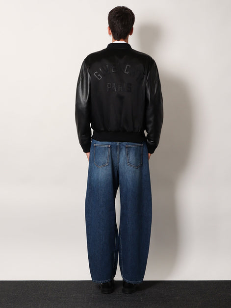Cotton and nylon jacket with leather sleeves