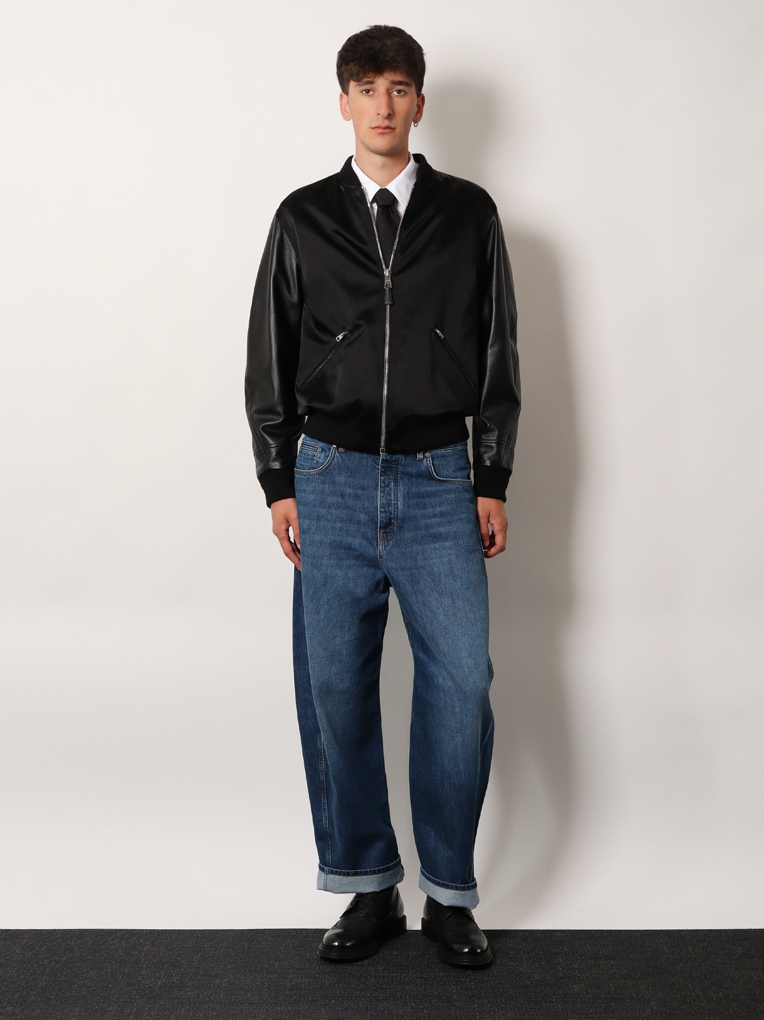 Cotton and nylon jacket with leather sleeves
