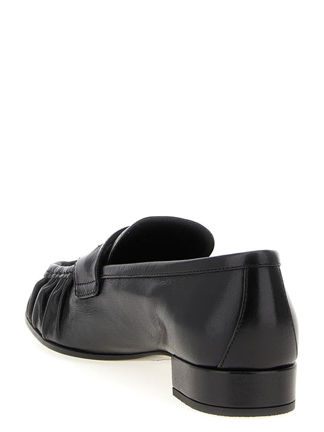 Curled toe moccasins