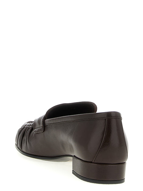 Curled toe moccasins