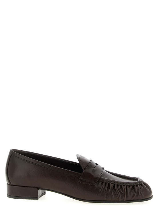 Curled toe moccasins