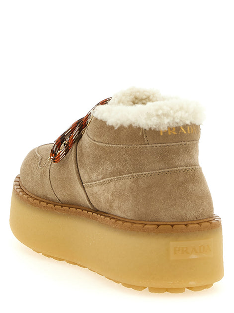 PRADA Lace-up ankle boots with shearling
