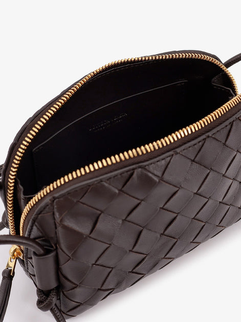 Leather clutch with Intrecciato Concert motif