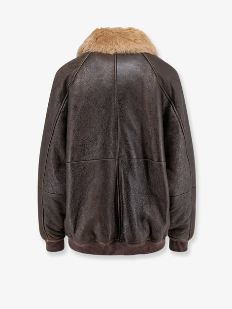Leather jacket with shearling collar