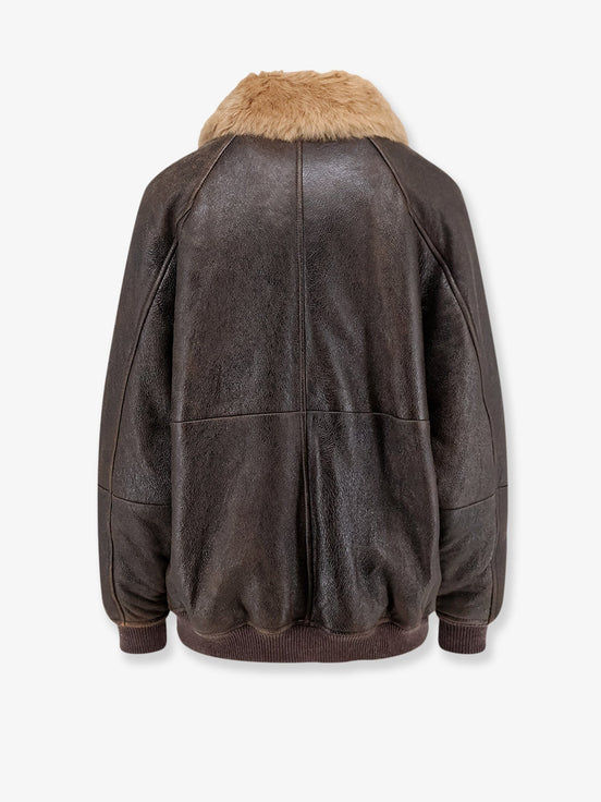 Leather jacket with shearling collar