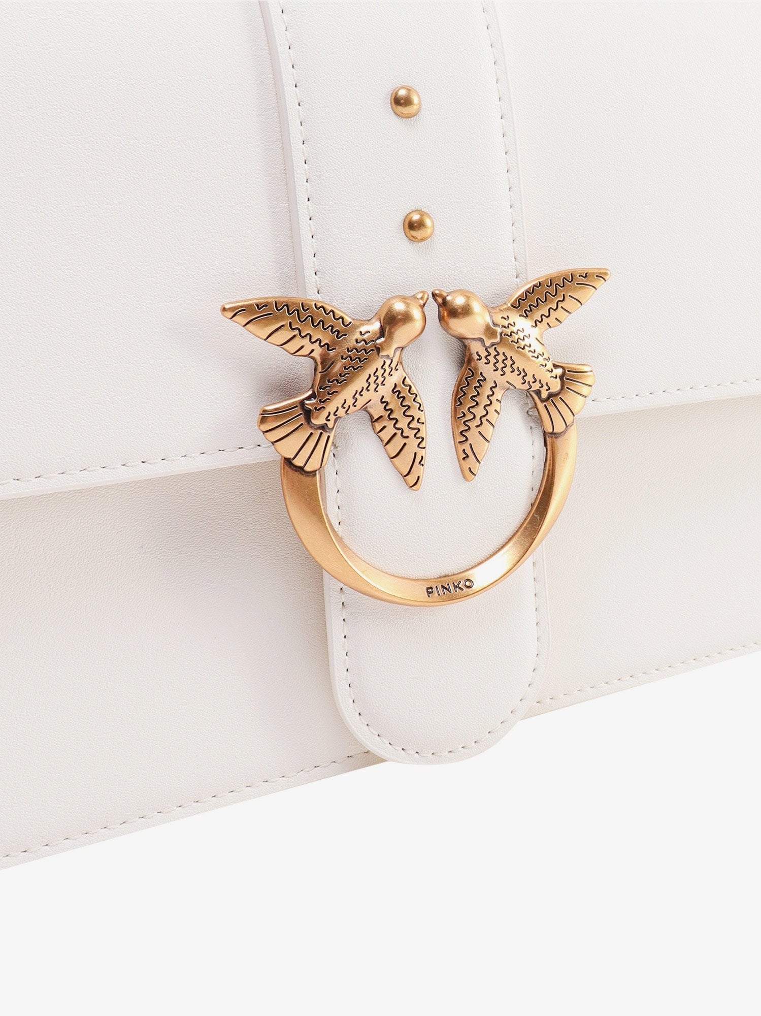 Leather shoulder bag with love birds buckle