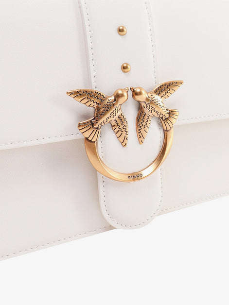 Leather shoulder bag with love birds buckle