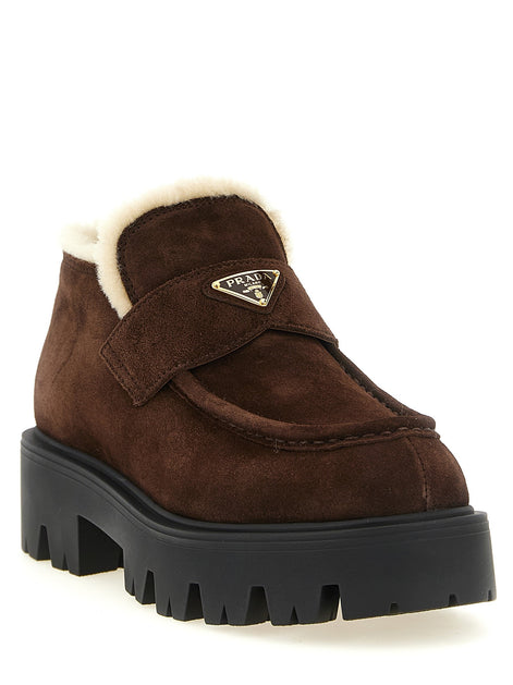 PRADA Loafers with fur and enamel logo