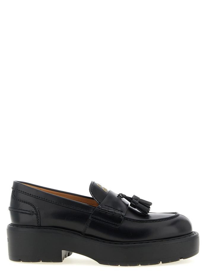 Loafers with tassels