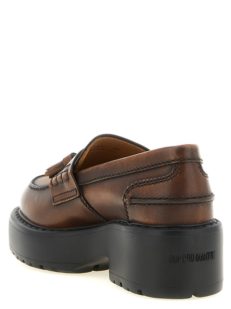 Miu Miu Loafers with tassels
