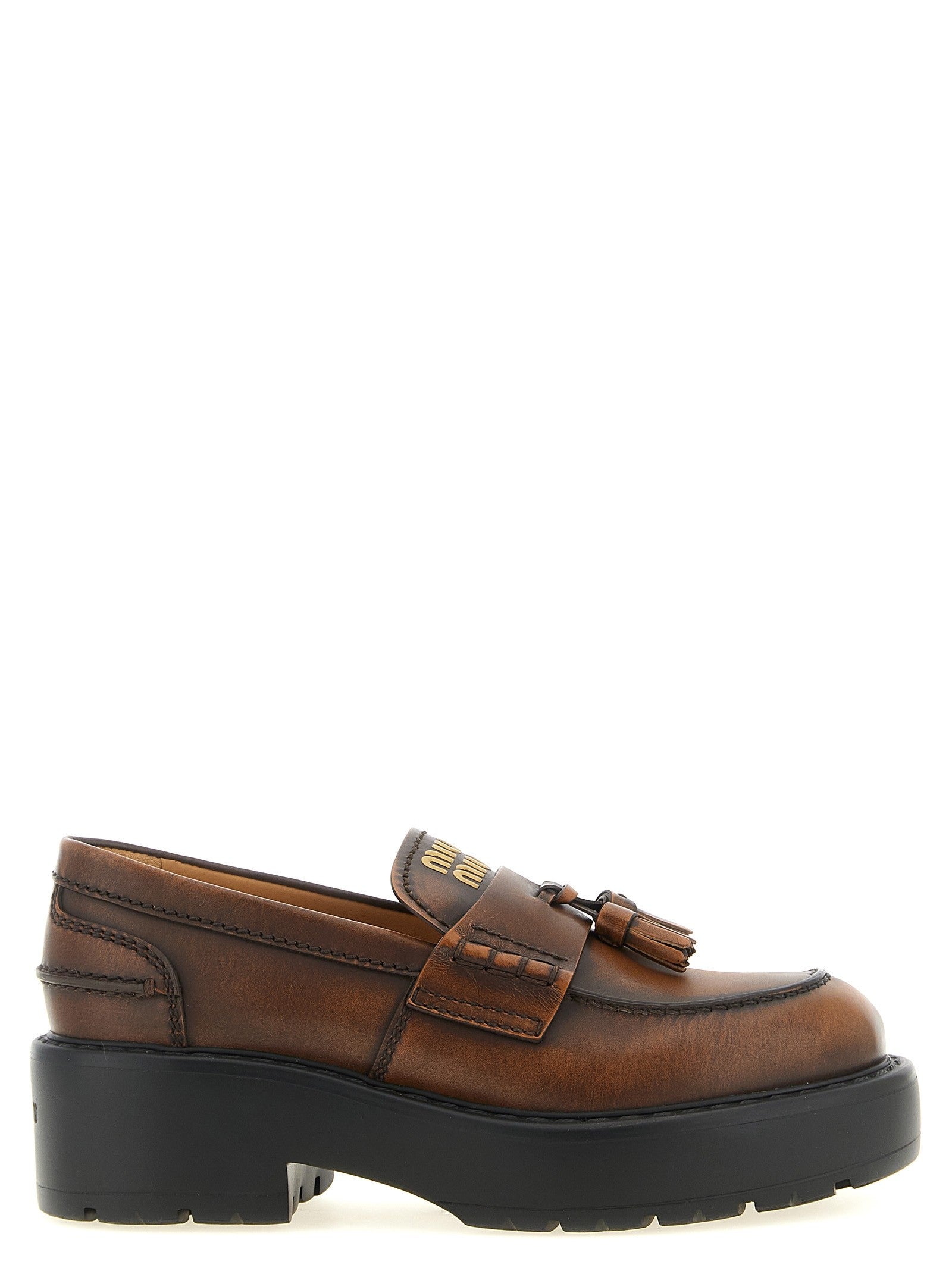 Loafers with tassels