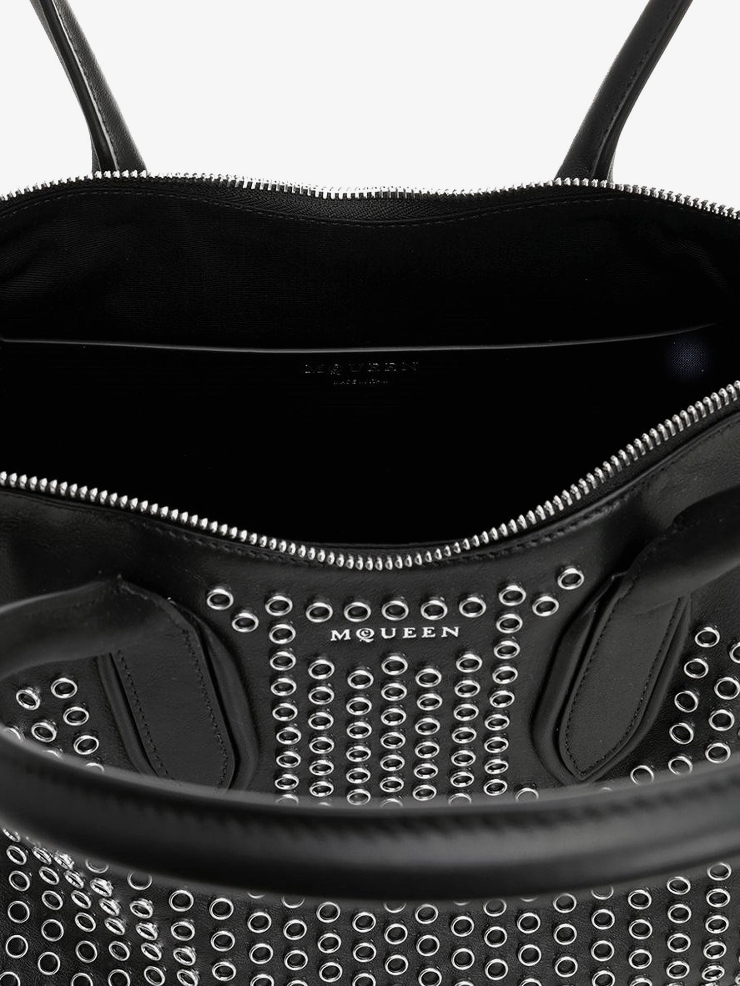Manta leather shoulder bag with all-over metal details