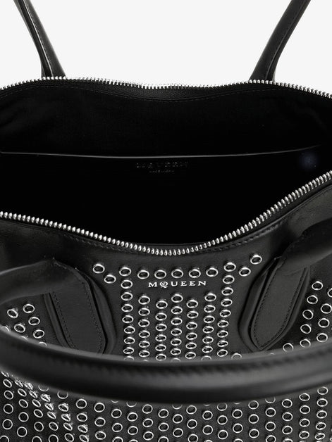 Manta leather shoulder bag with all-over metal details