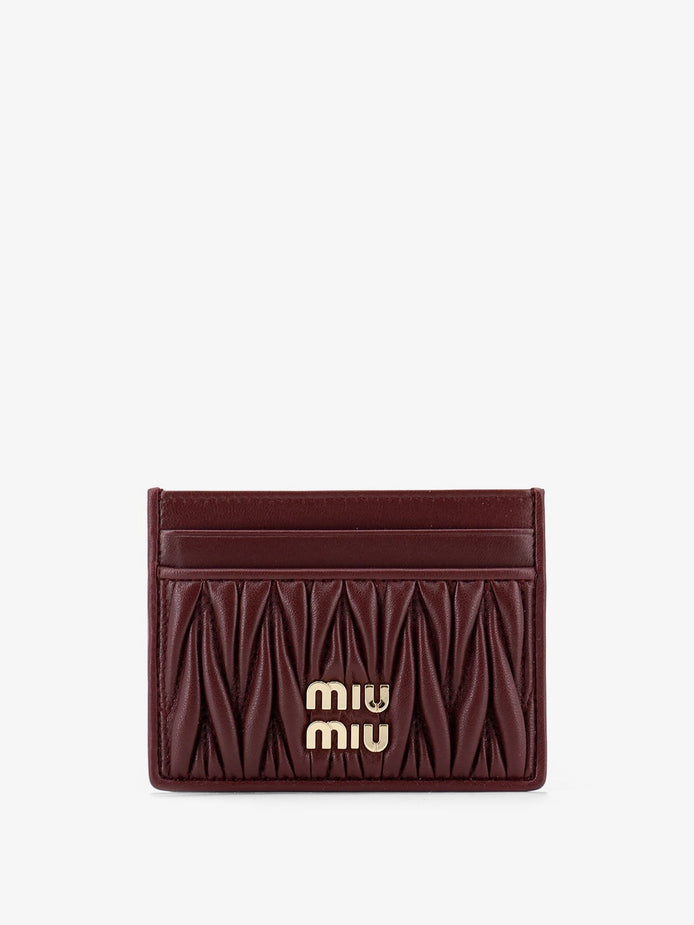 Matelassé leather card holder with metal lettering logo