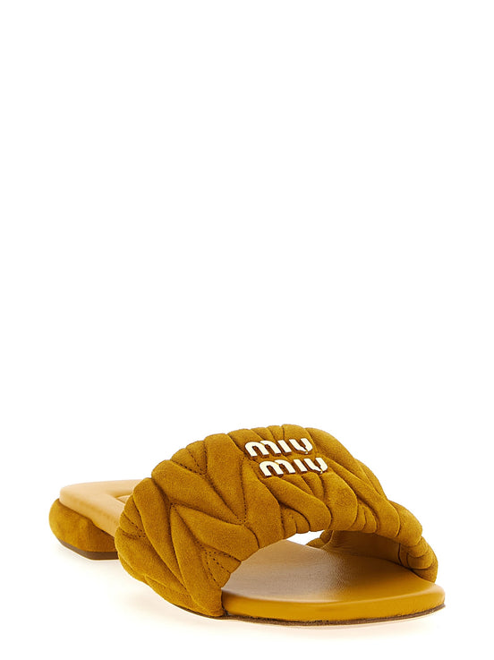 Matelassé suede slides