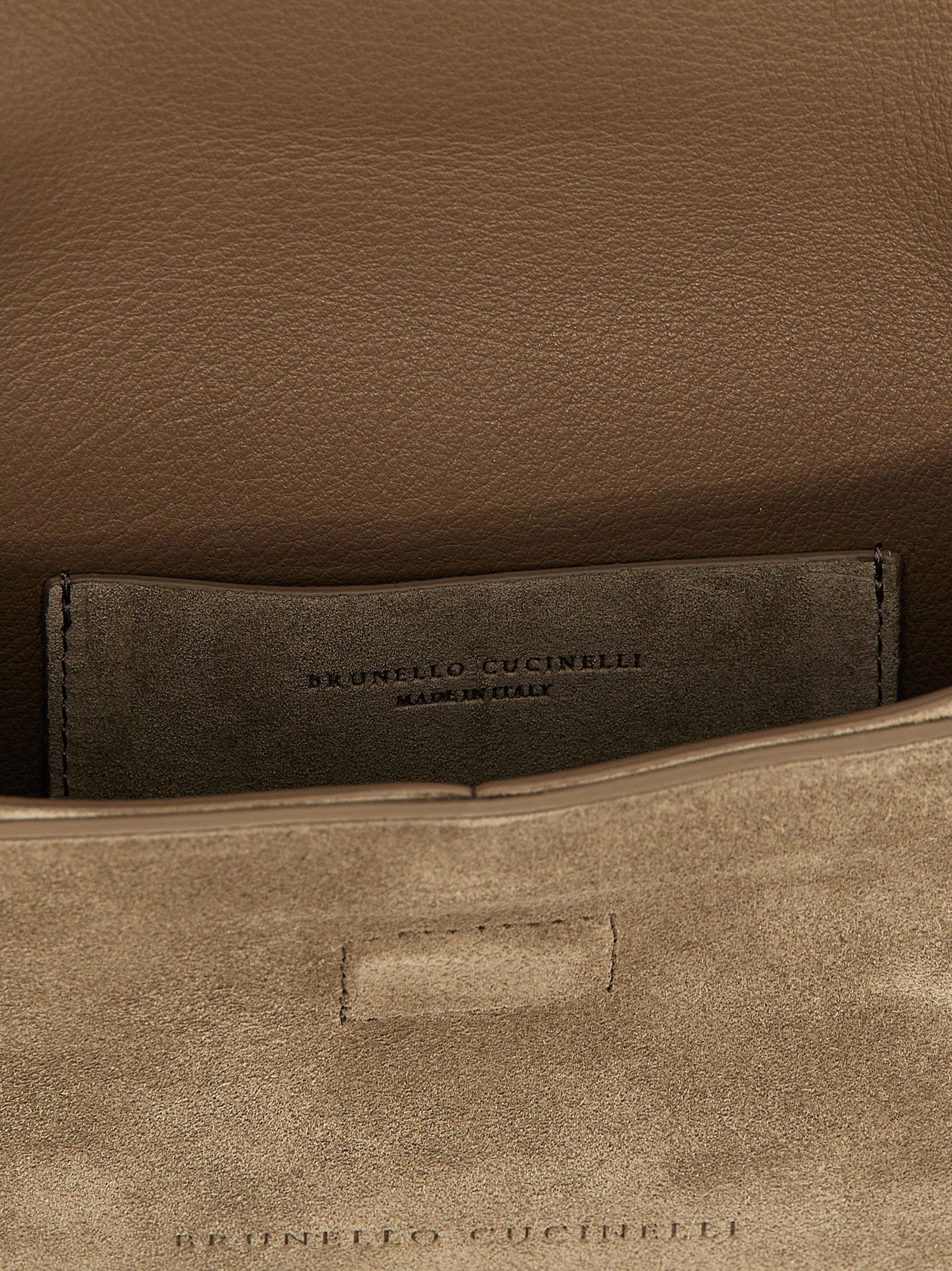 Monile suede clutch bag