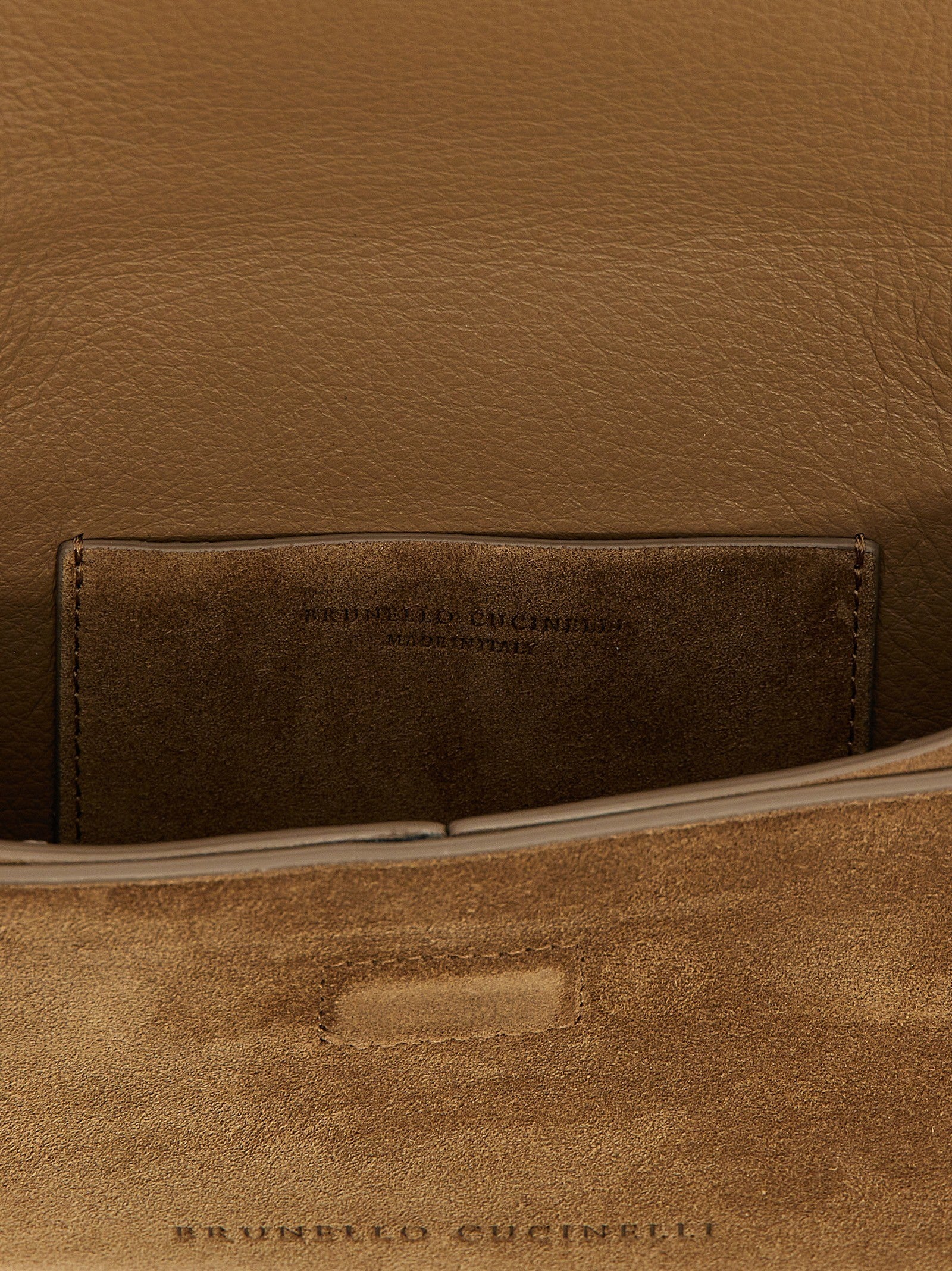 Monile suede clutch bag