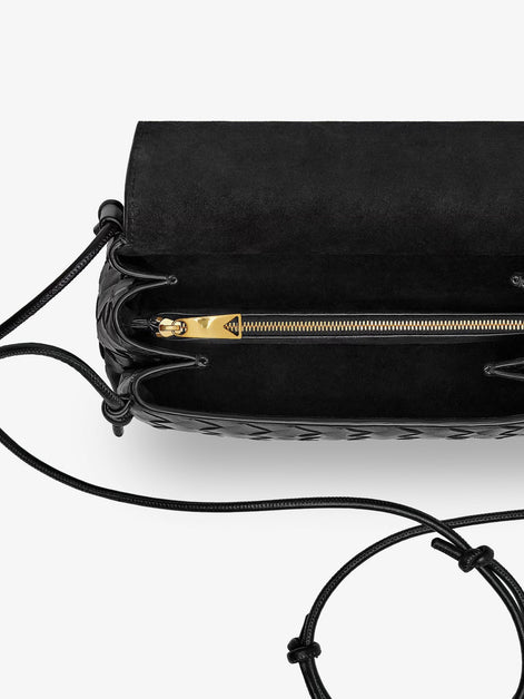 Bottega Veneta Notturno clutch bag with leather shoulder strap