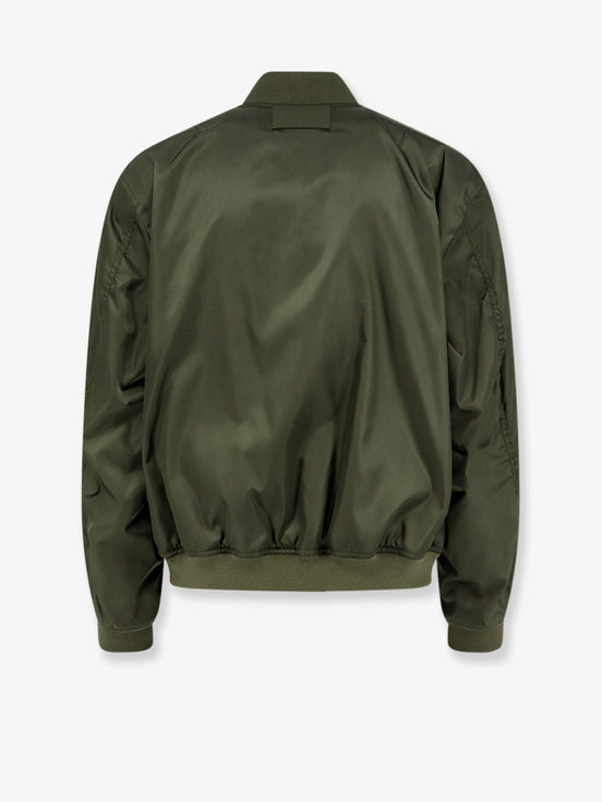 Nylon bomber with orange lining