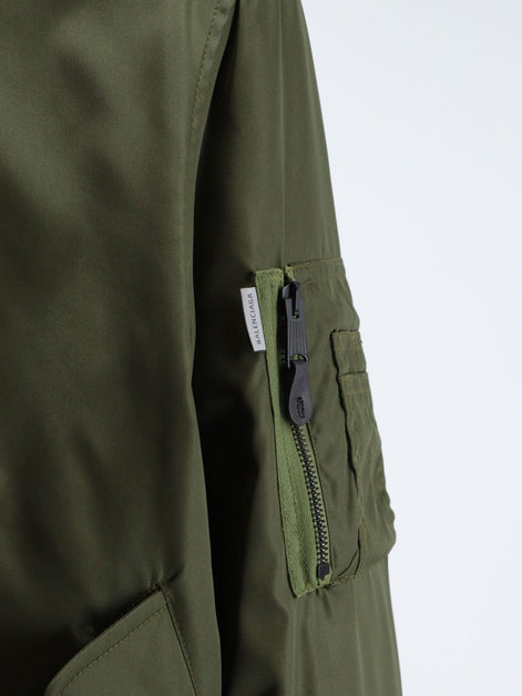 Nylon bomber with orange lining