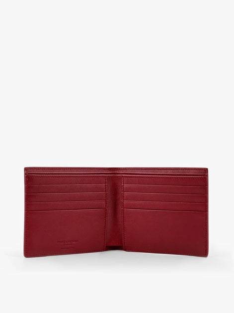 Saint Laurent Patent leather wallet with engraved logo on the front