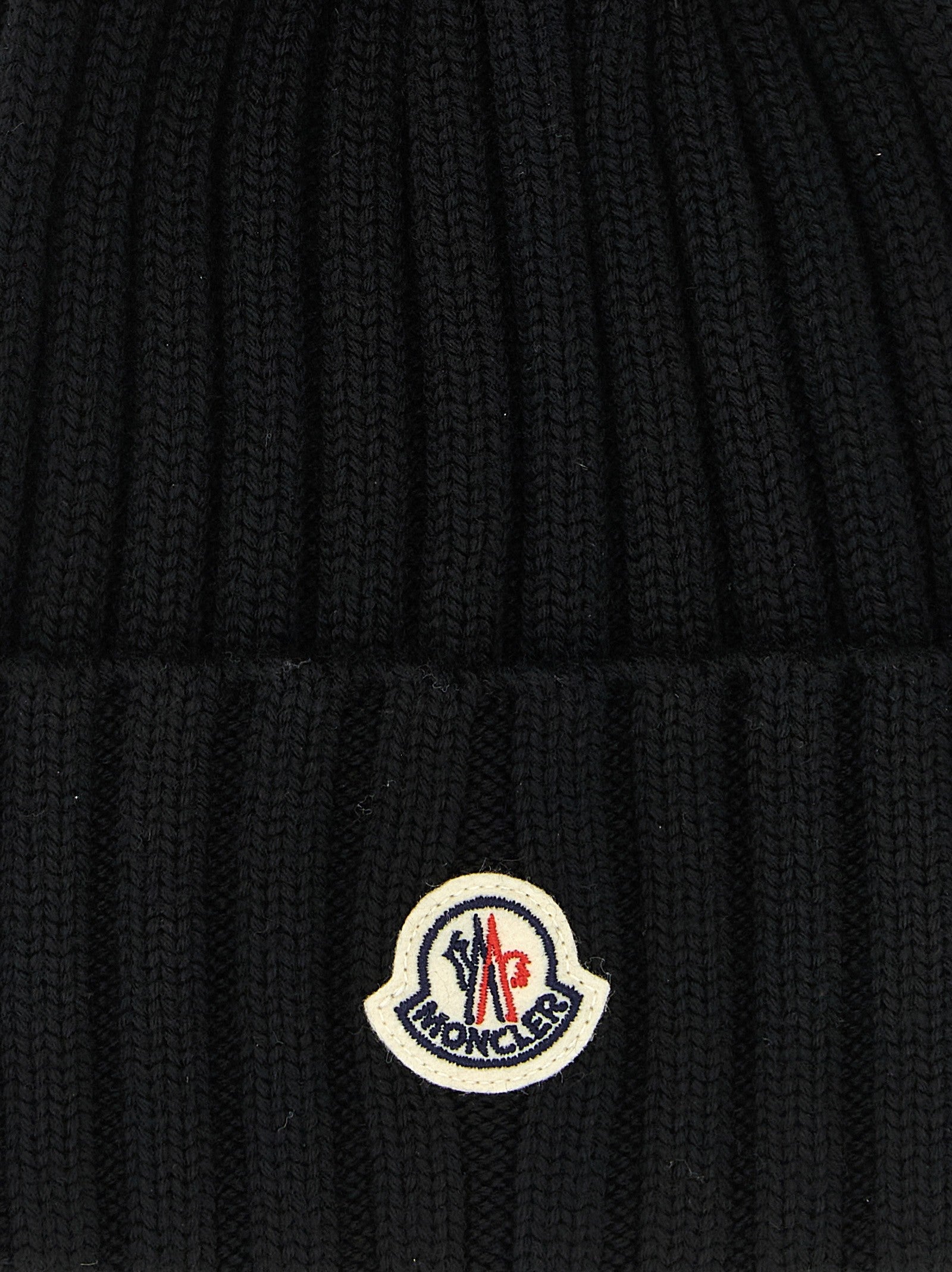 Pompon wool beanie