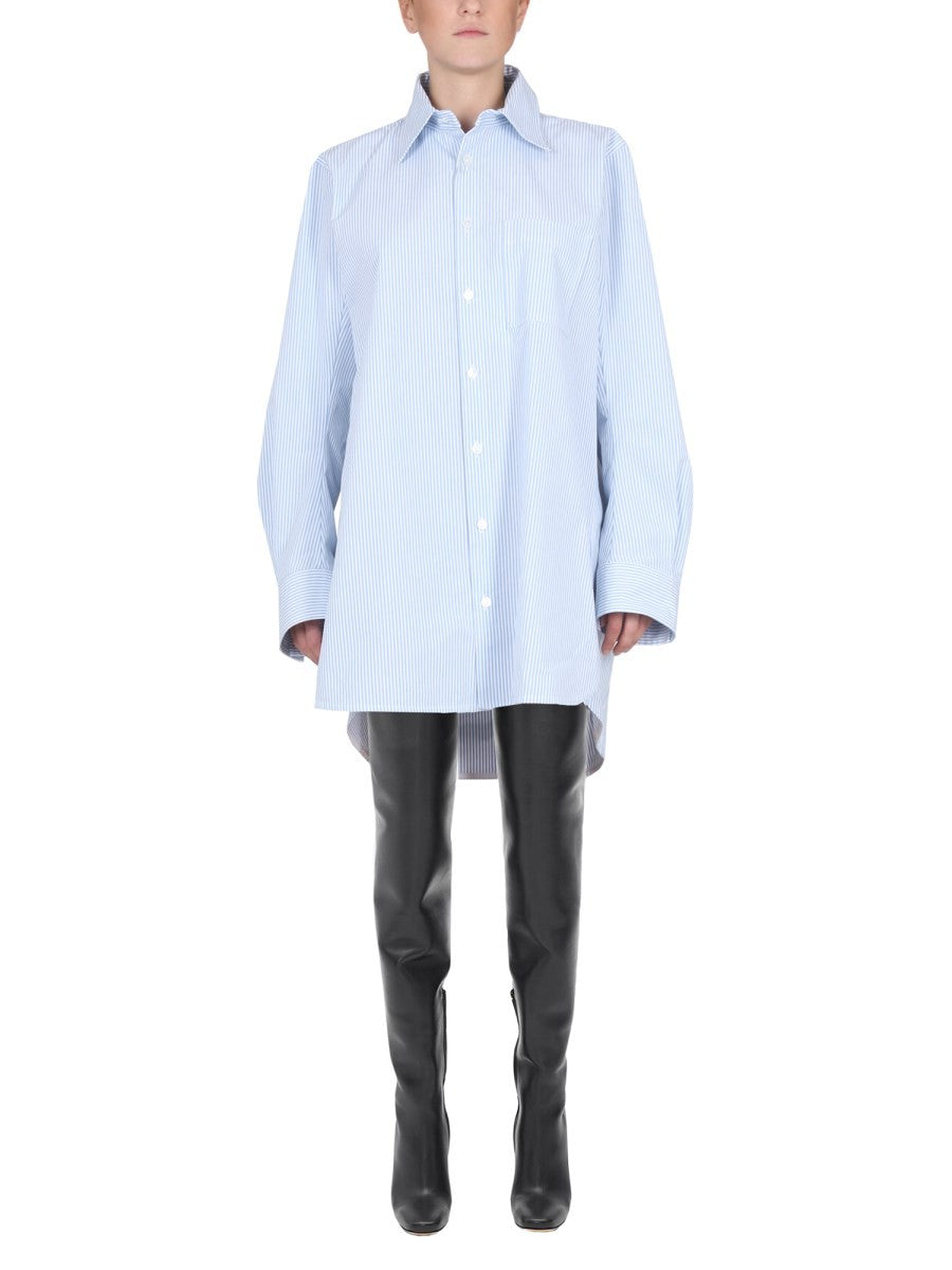 SHIRT WITH CURVED BACK