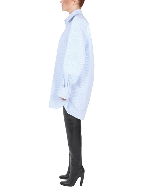 SHIRT WITH CURVED BACK