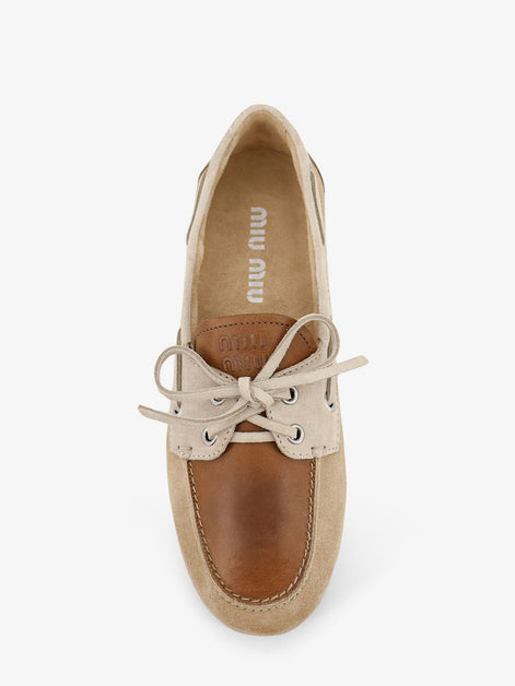 Suede loafer with leather inserts